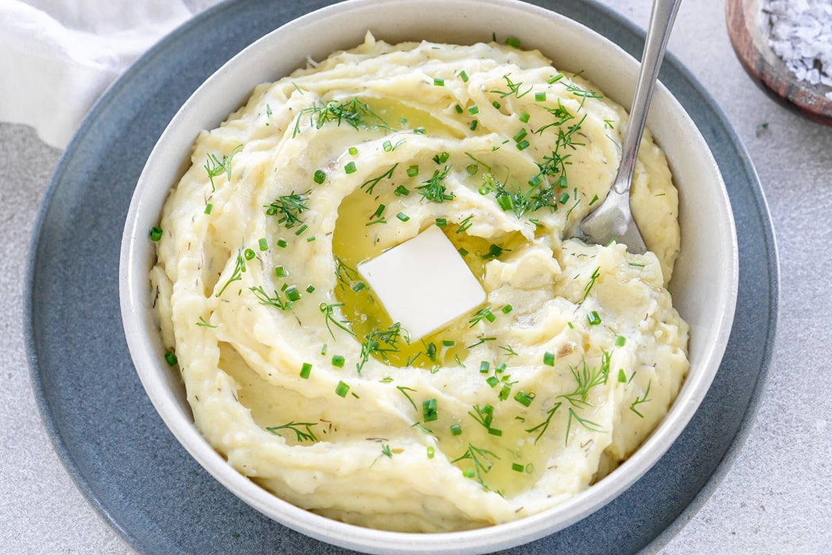 overhead shot of bowl of slow cooker dill mashed potatoes