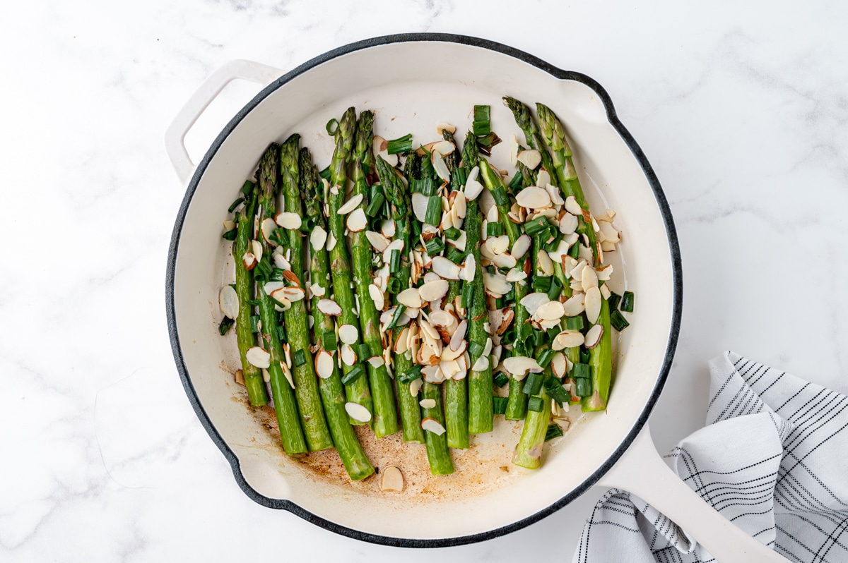 asparagus and almonds in a pan
