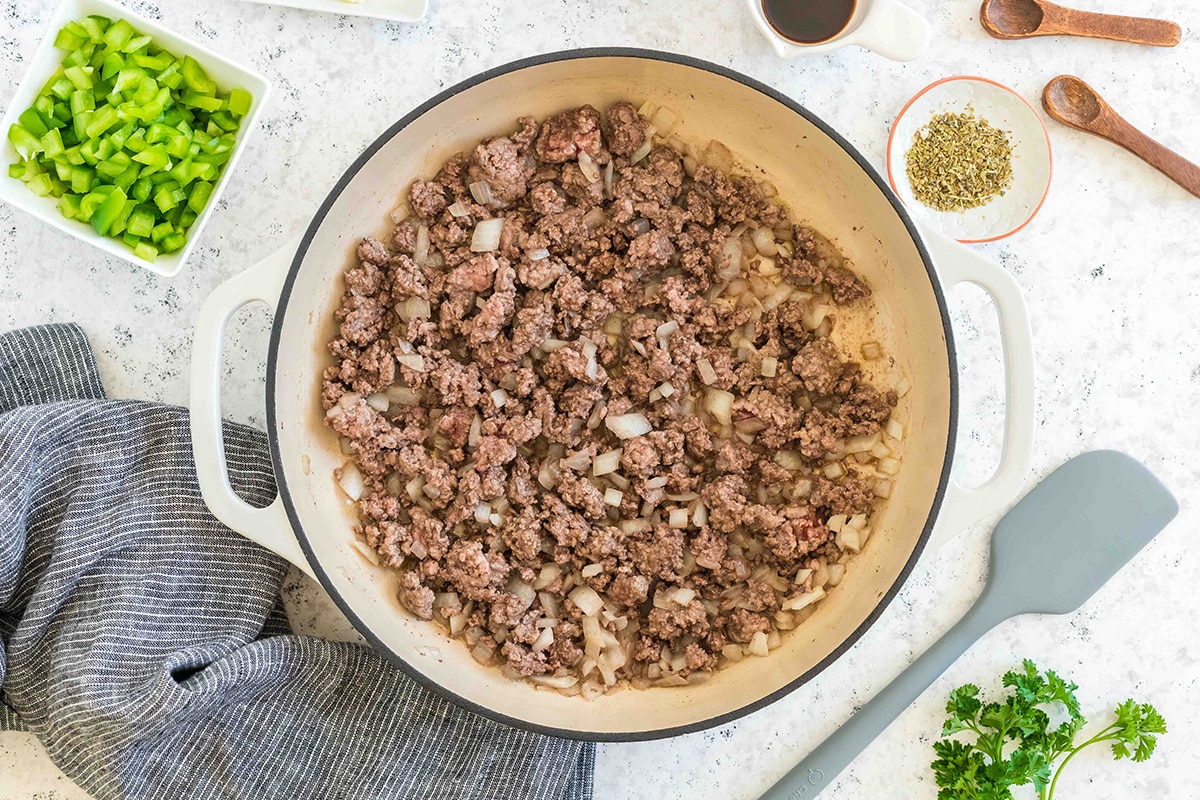 onion and ground beef in pan