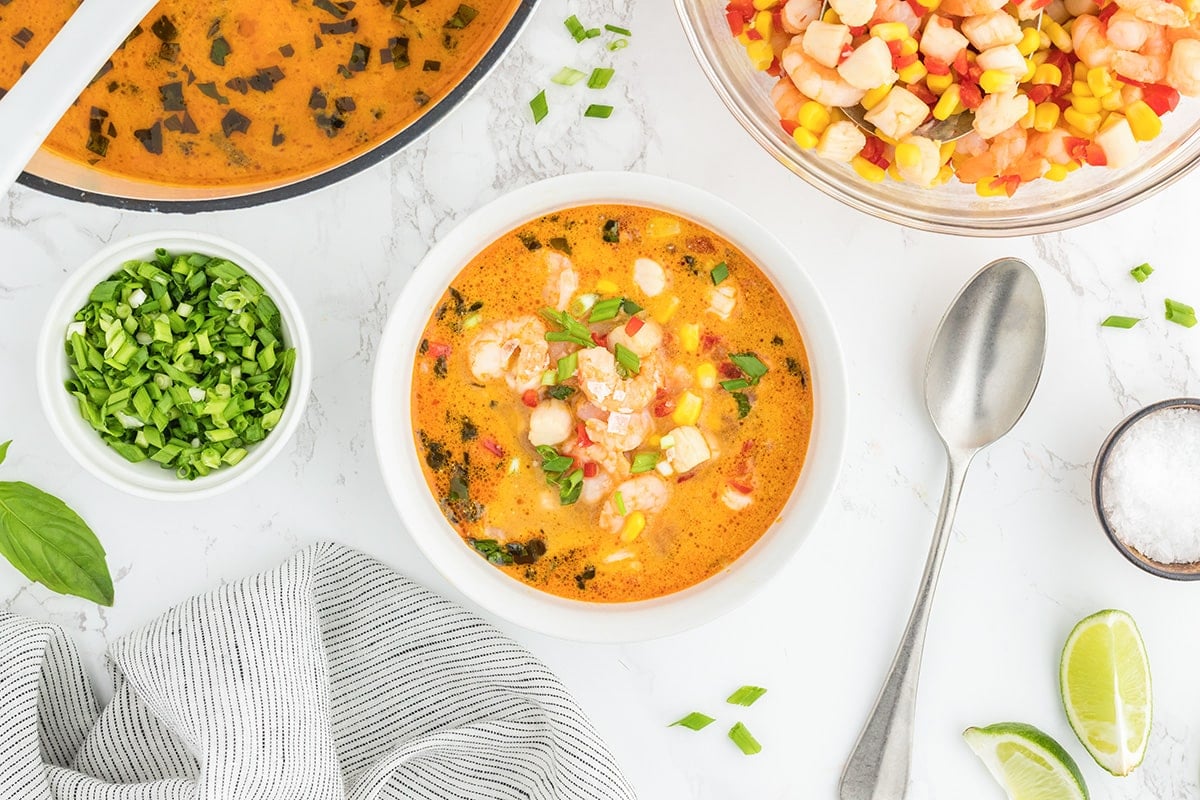 bowl of thai coconut soup with spoon