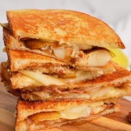close up of grilled cheese sandwich with bacon and pears
