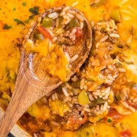 stuffed pepper casserole with wooden spoon in pan
