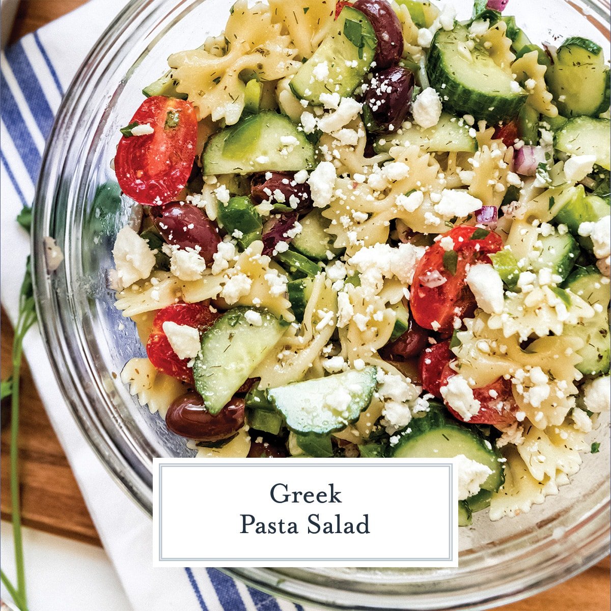 close up of greek pasta salad with crumbled feta cheese