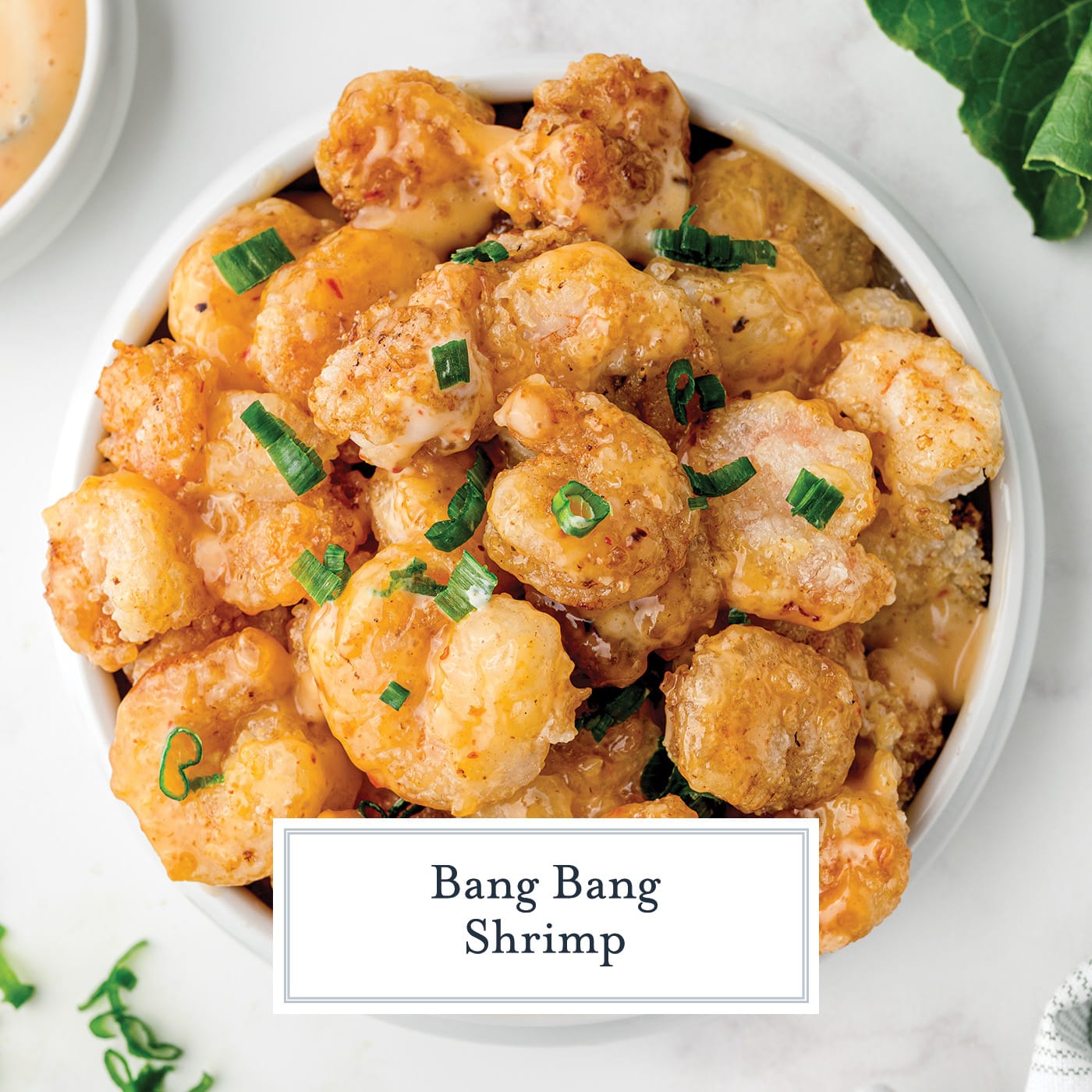 overhead shot of bowl of firecracker shrimp with text overlay for facebook