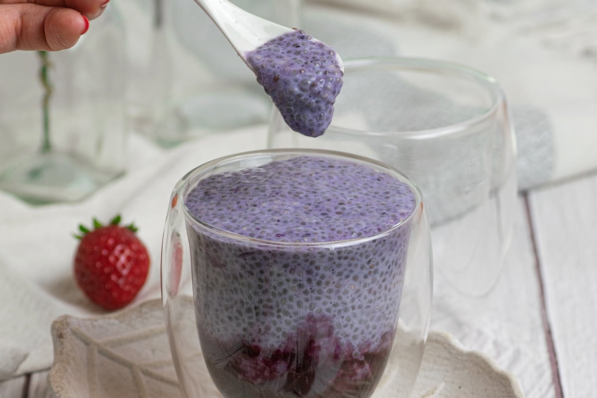 chia pudding spooned into jar
