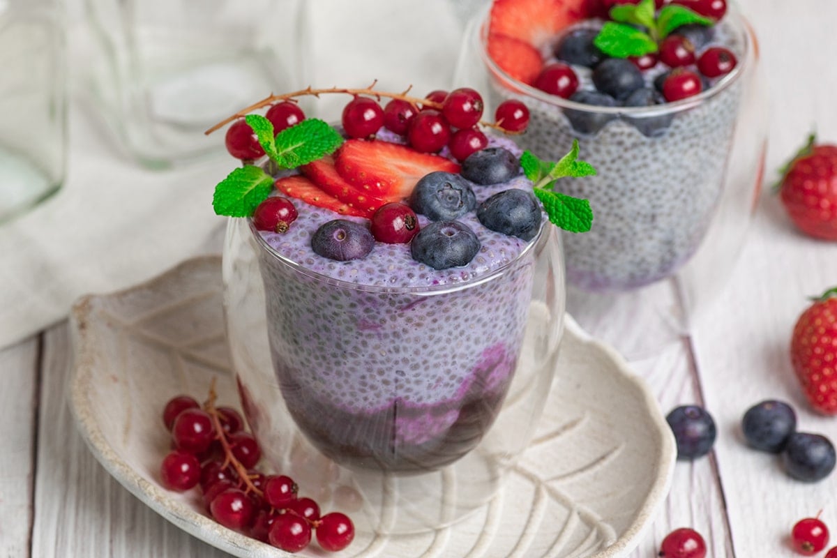 close up of chia seed pudding topped with berries