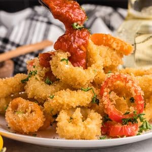 marinara poured onto fried calamari