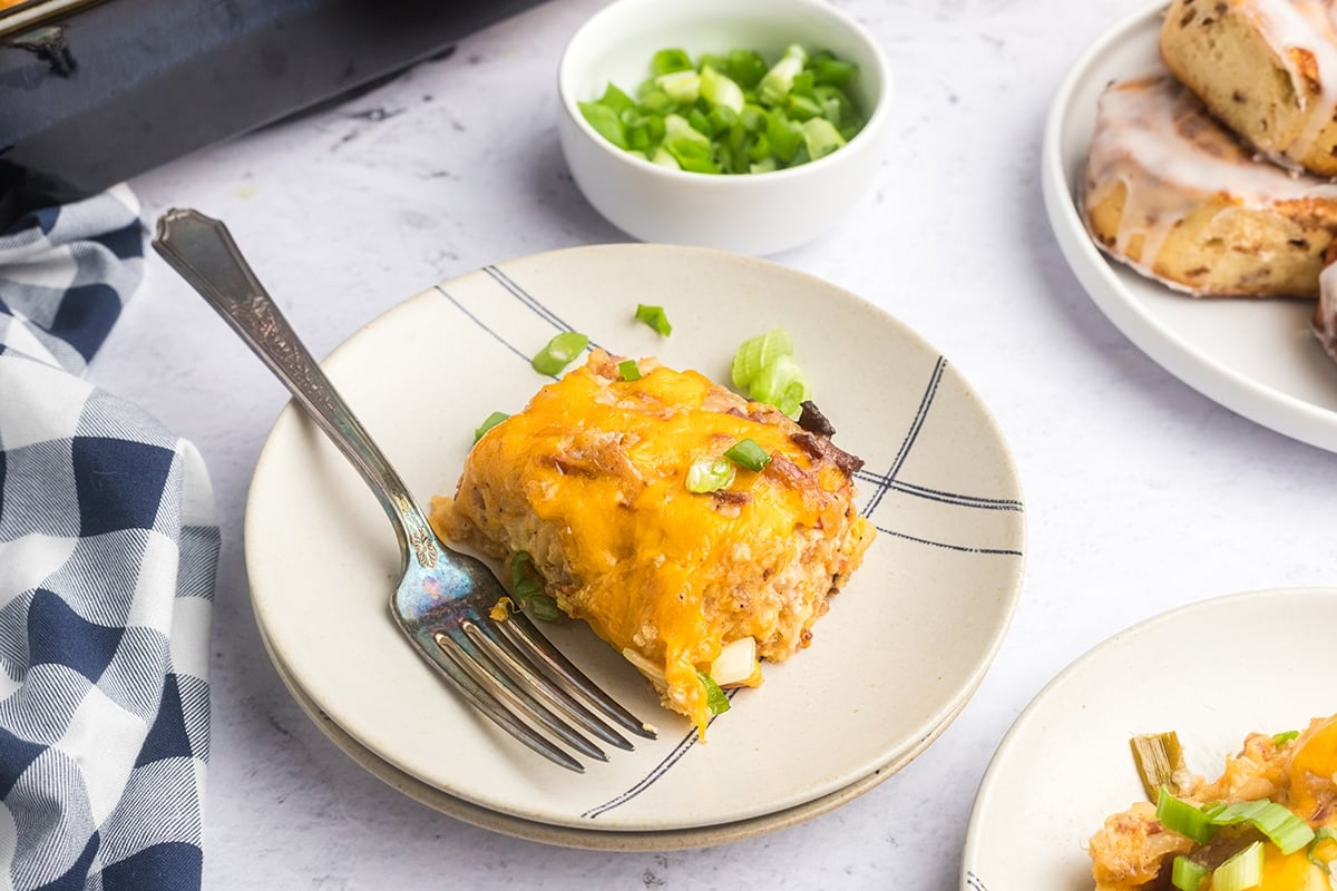 angled shot of hash brown casserole on a plate