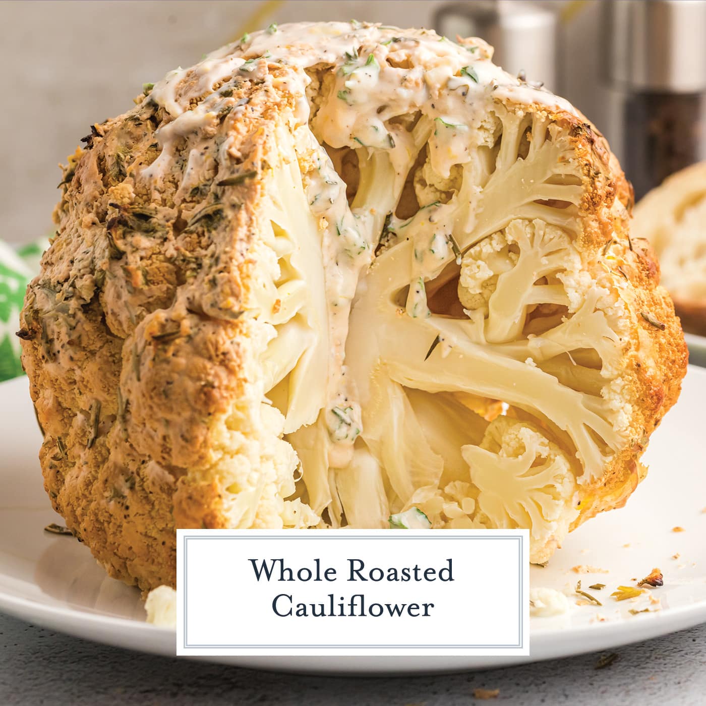 straight on shot of whole roasted cauliflower head with text overlay for facebook