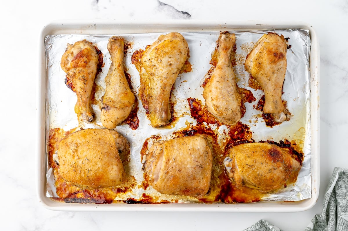 jerk chicken baking on a tray