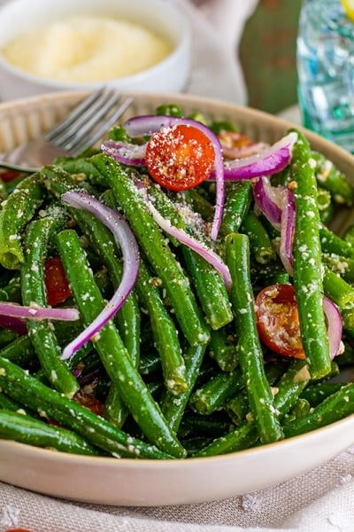 bowl of green bean salad with a fork