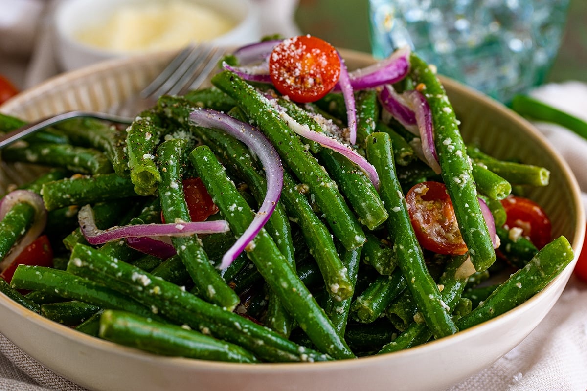 close up of bowl of marinated green beans