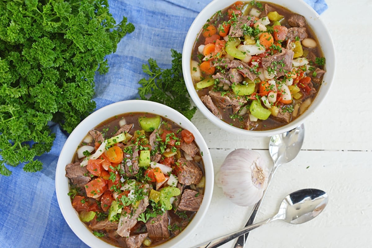 overhead shot of two bowls of short rib soup