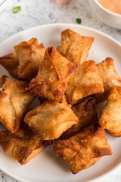 angled shot of shrimp rangoon on plate