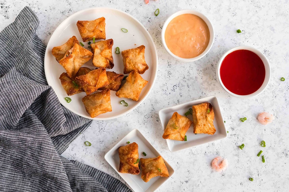 overhead shot of shrimp wontons with dipping sauce