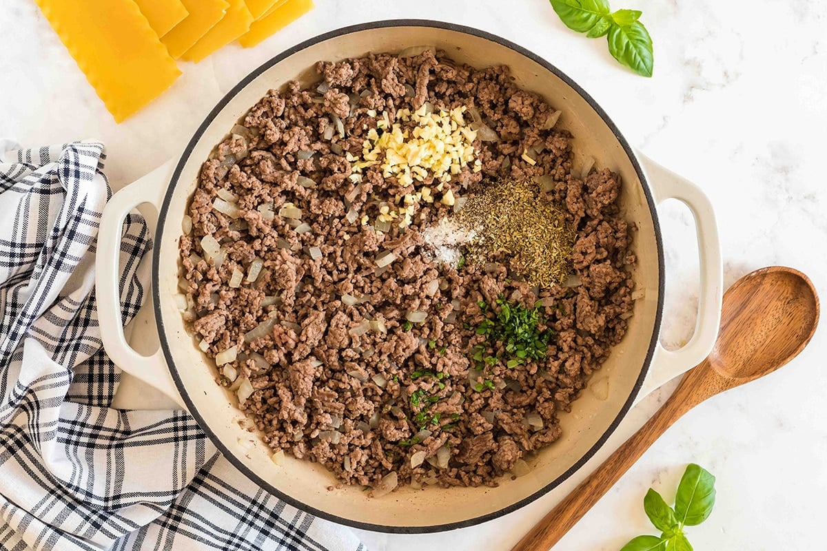ground beef with seasonings in a pan