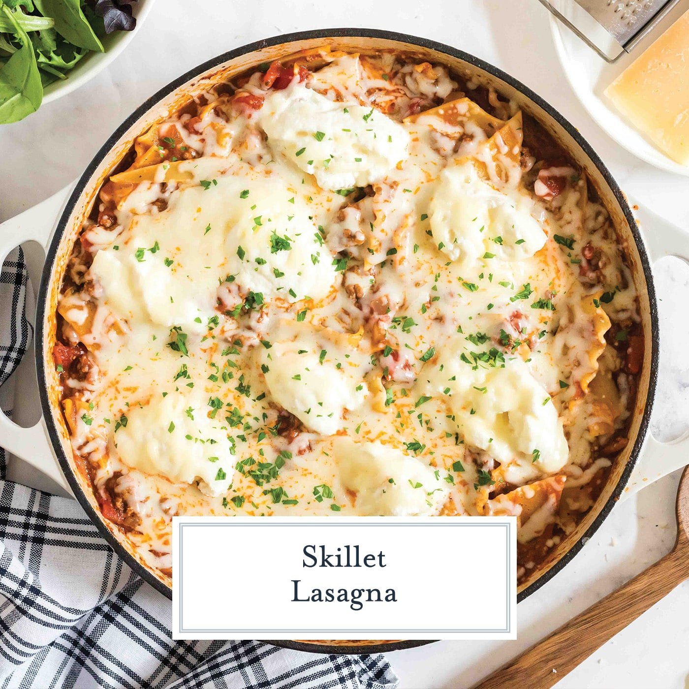 overhead shot of skillet lasagna with text overlay for facebook