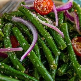 close up of bowl of marinated green beans
