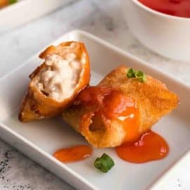 shrimp rangoon with sauce cut in half