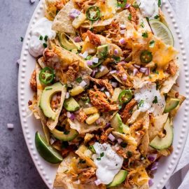 overhead shot of platter of tropical chicken nachos