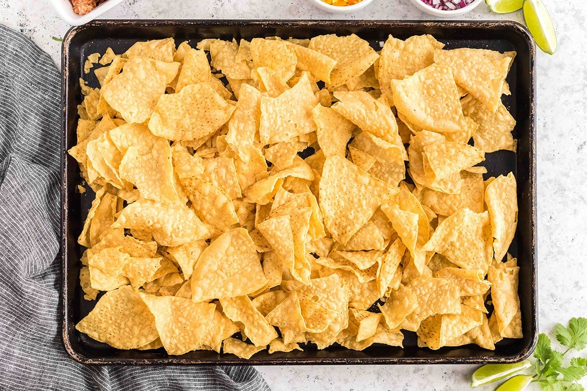 tortilla chips on a sheet pan