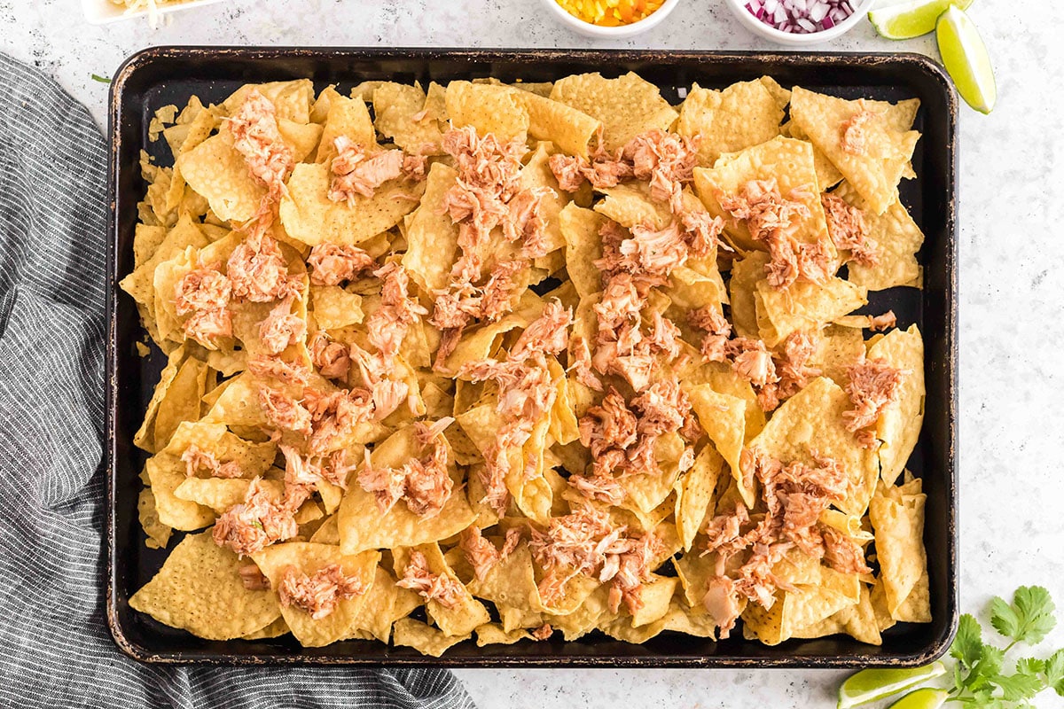 shredded bbq chicken on tortilla chips