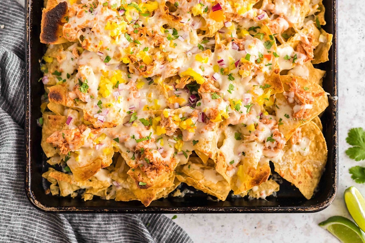 bbq chicken nachos on a sheet pan