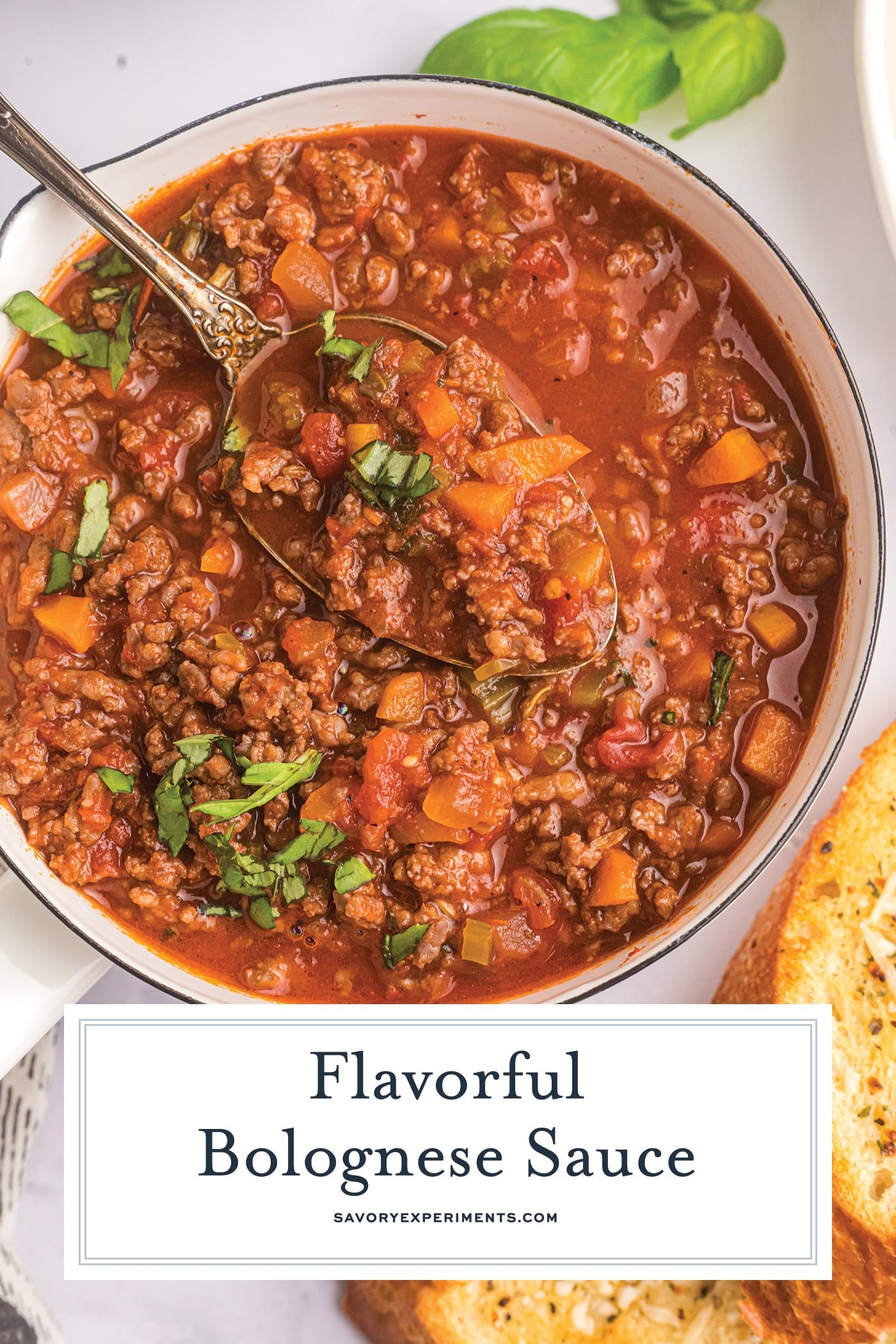 bowl of bolognese sauce with spoon with text overlay for pinterest