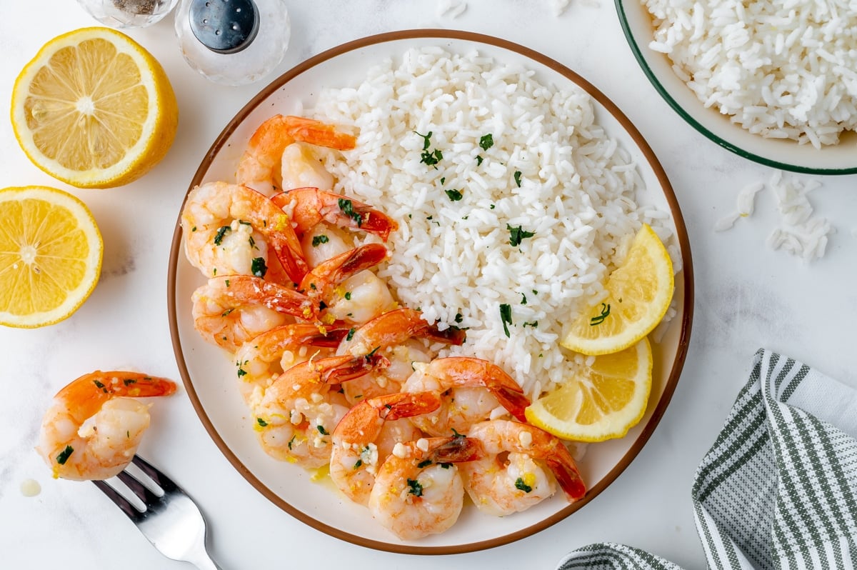 overhead shot of shrimp and rice on a plate