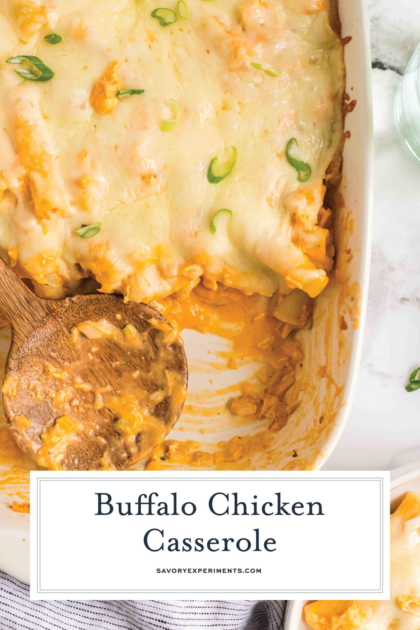 overhead shot of casserole dish with buffalo chicken pasta with text overlay for pinterest