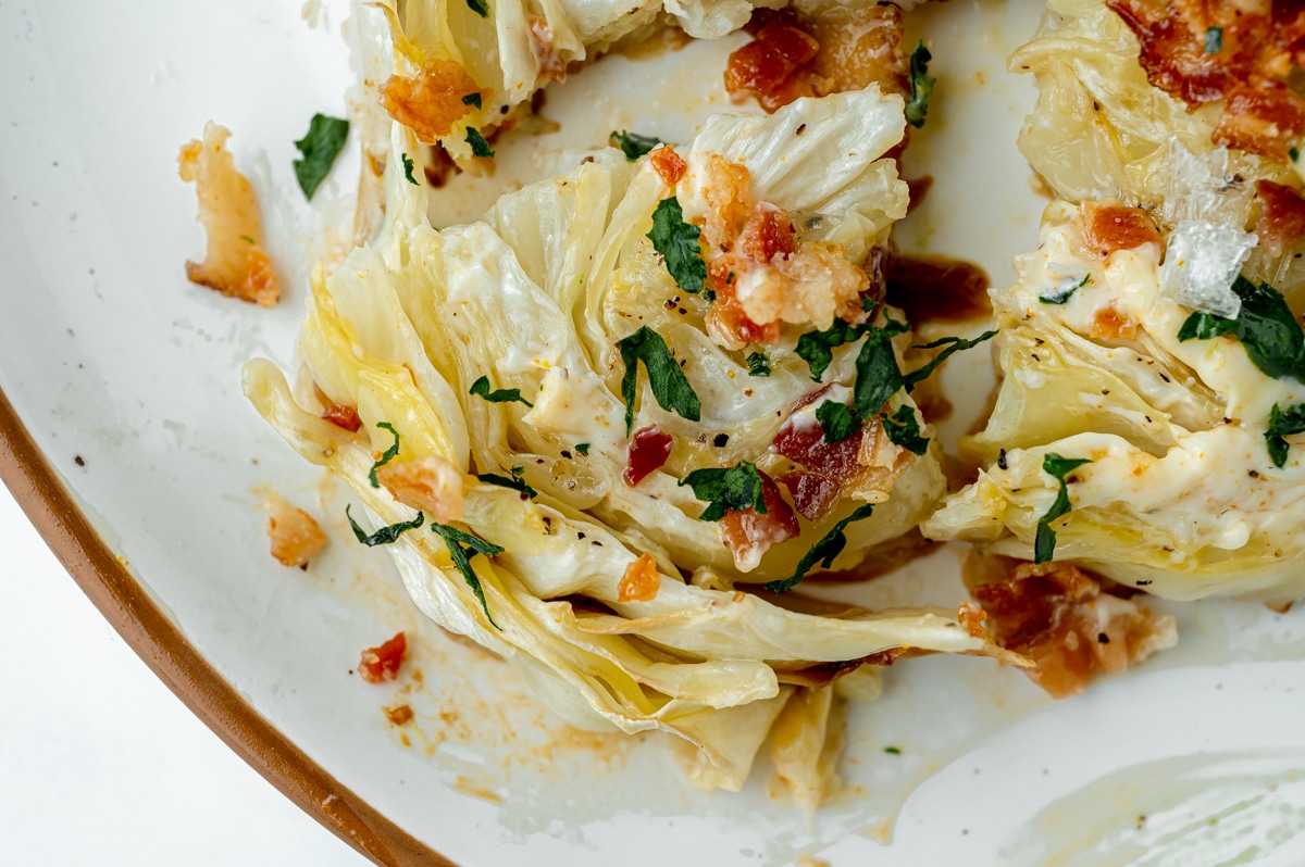 close up of bite of cabbage steaks