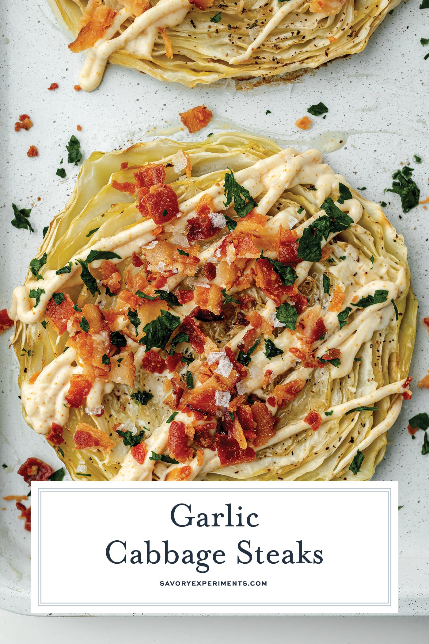 overhead shot of cabbage steak with text overlay for pinterest