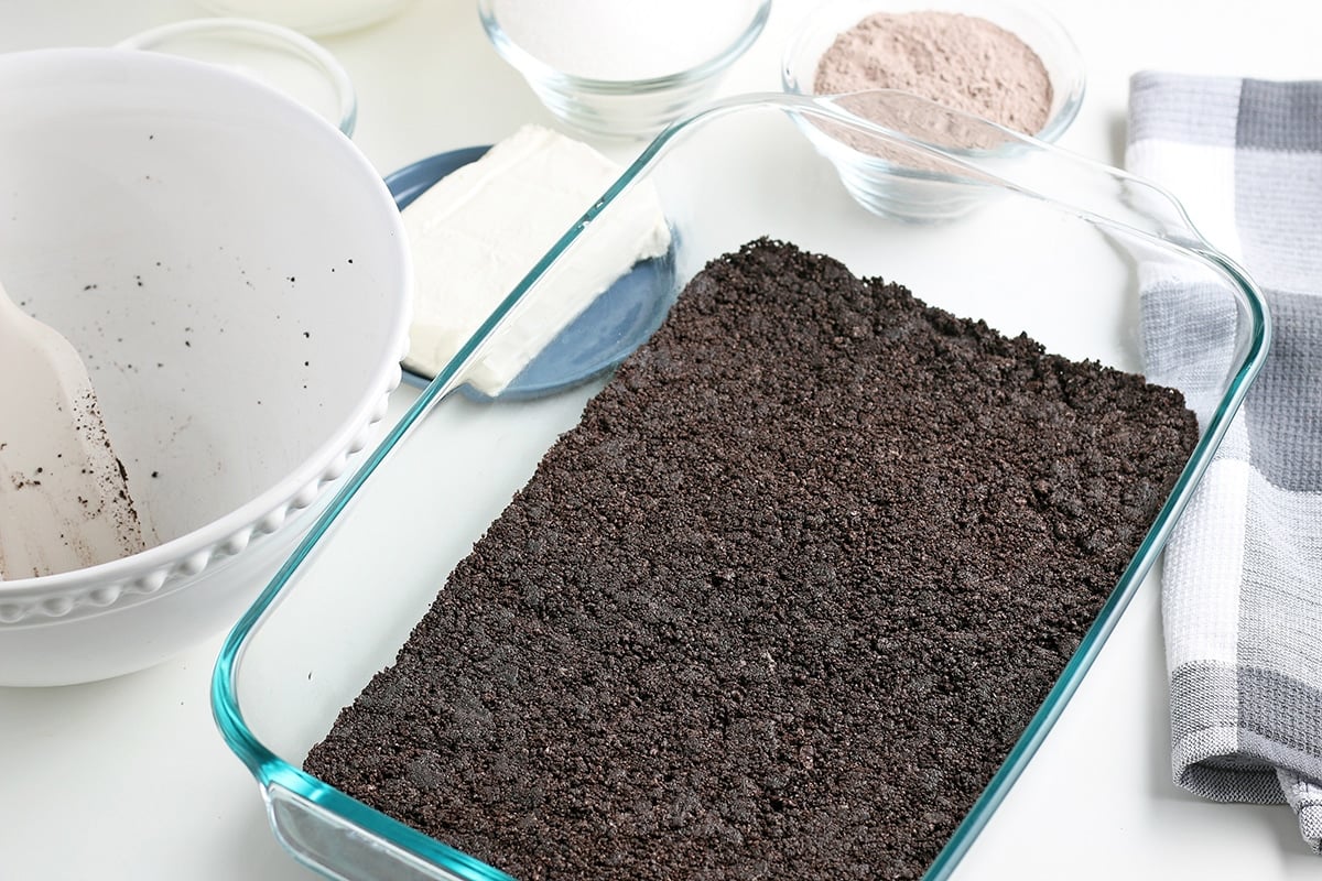 Oreo cookie crust in a baking dish