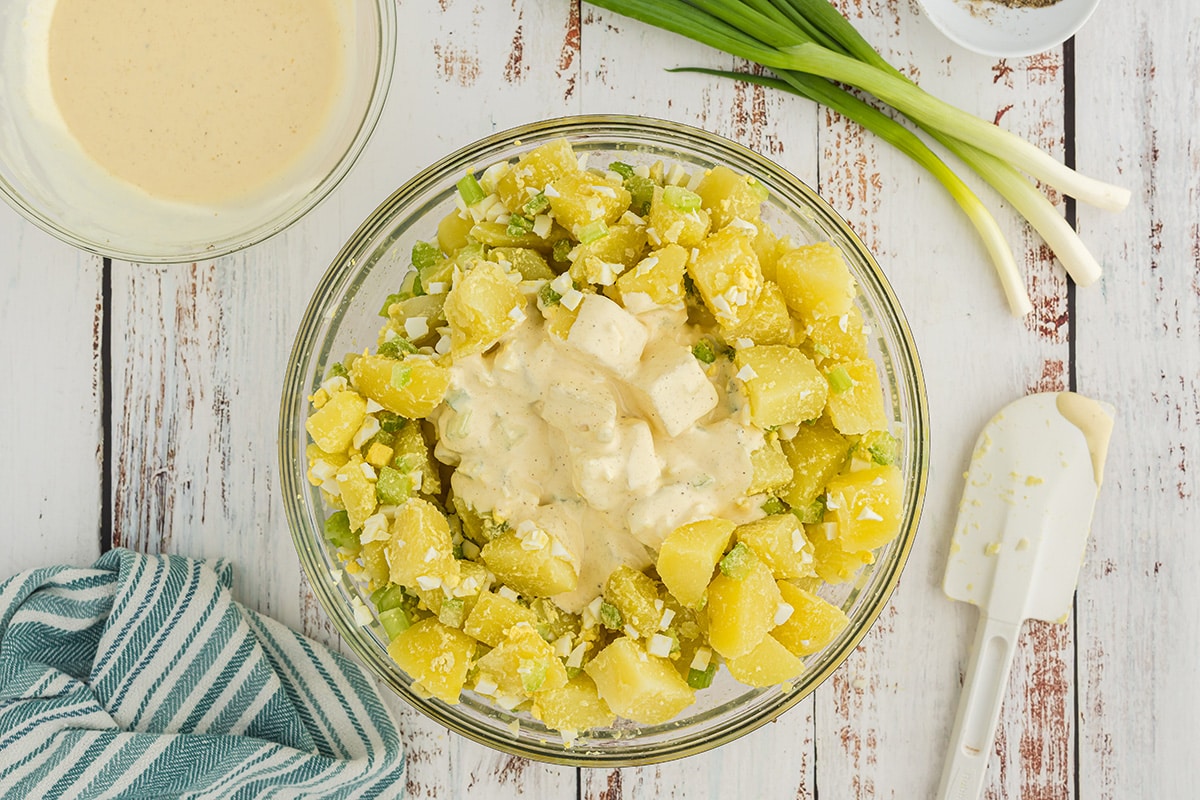 dressing added to potato salad mixture