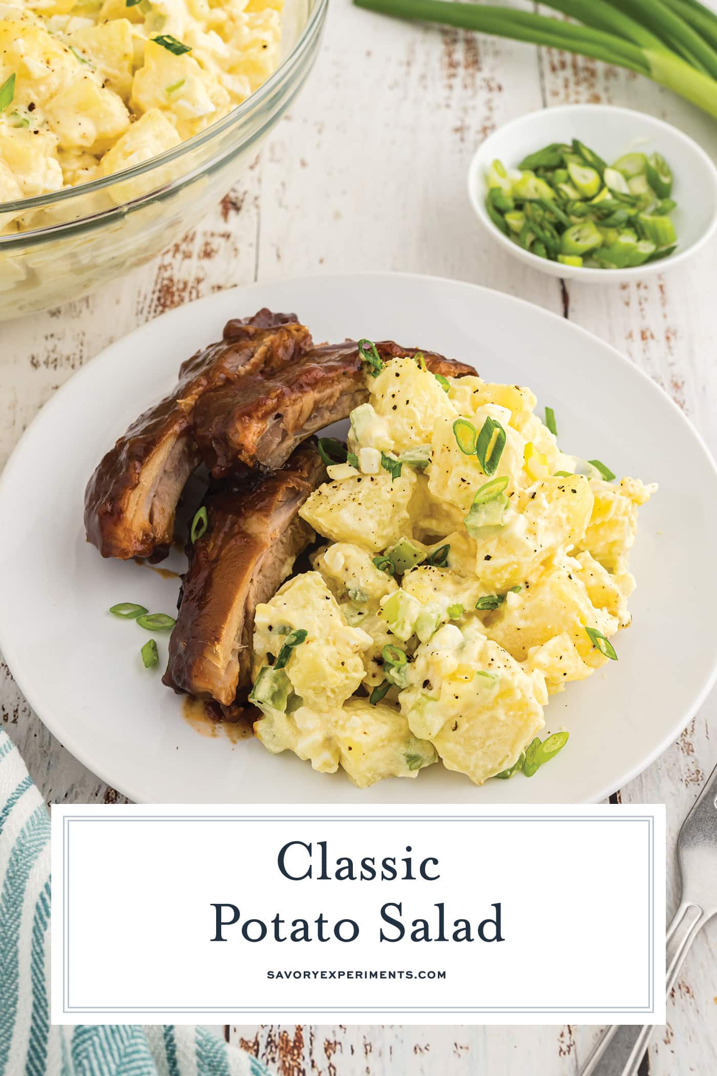 potato salad with ribs on a plate with text overlay for pitnerest
