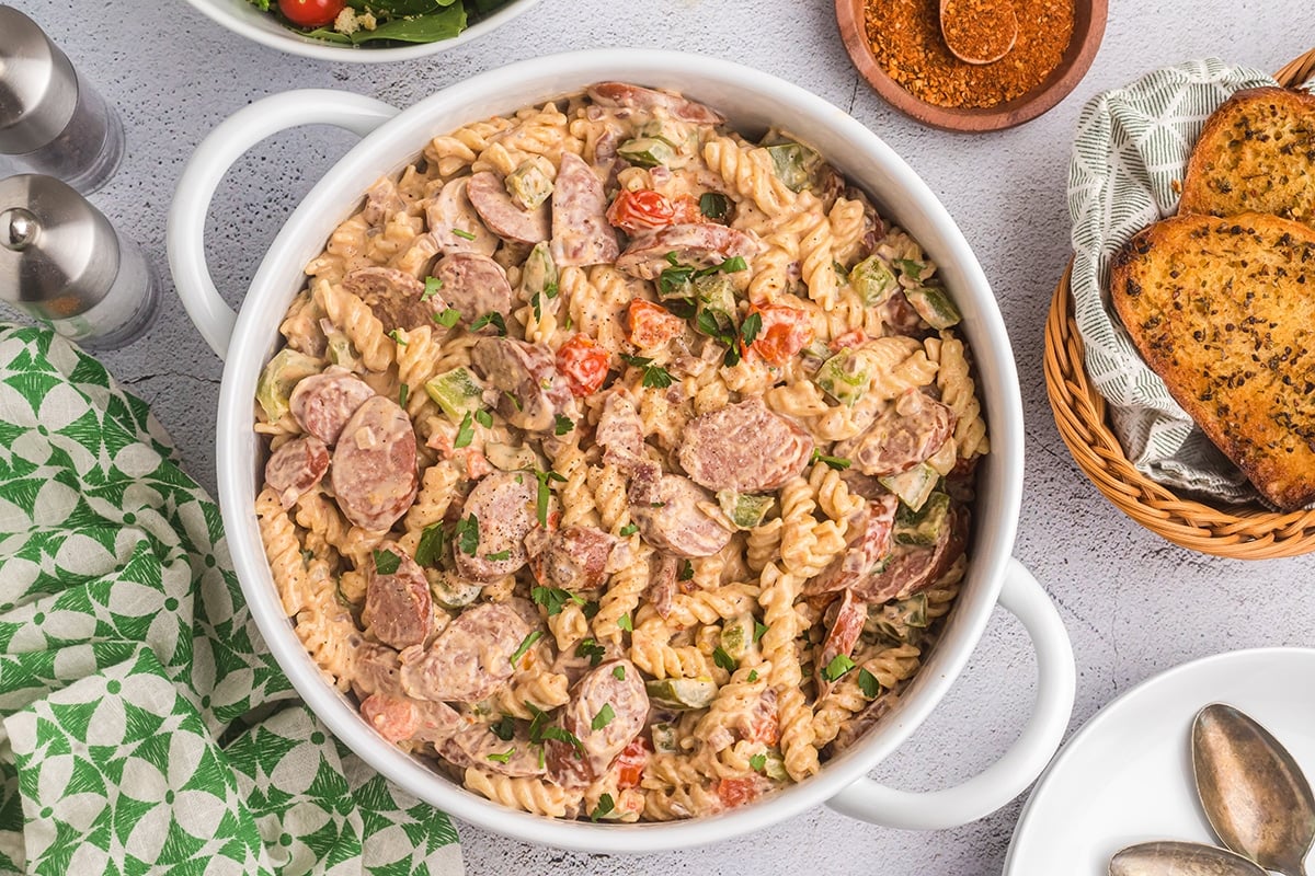 creamy cajun pasta in a white dish