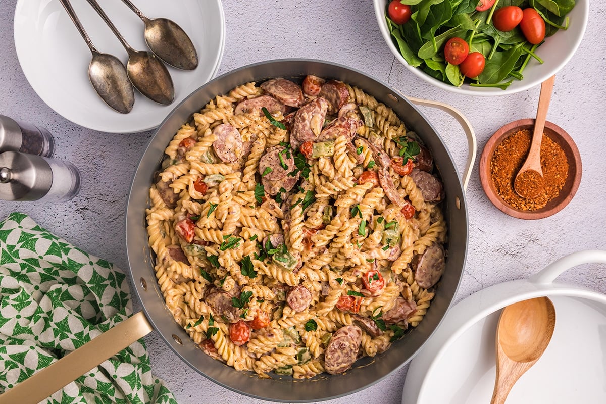 overhead shot of creamy cajun pasta in a pan