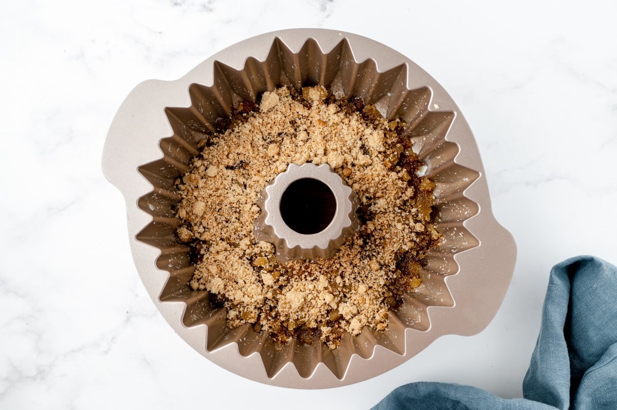 cinnamon and brown sugar mixed with butter in bundt pan