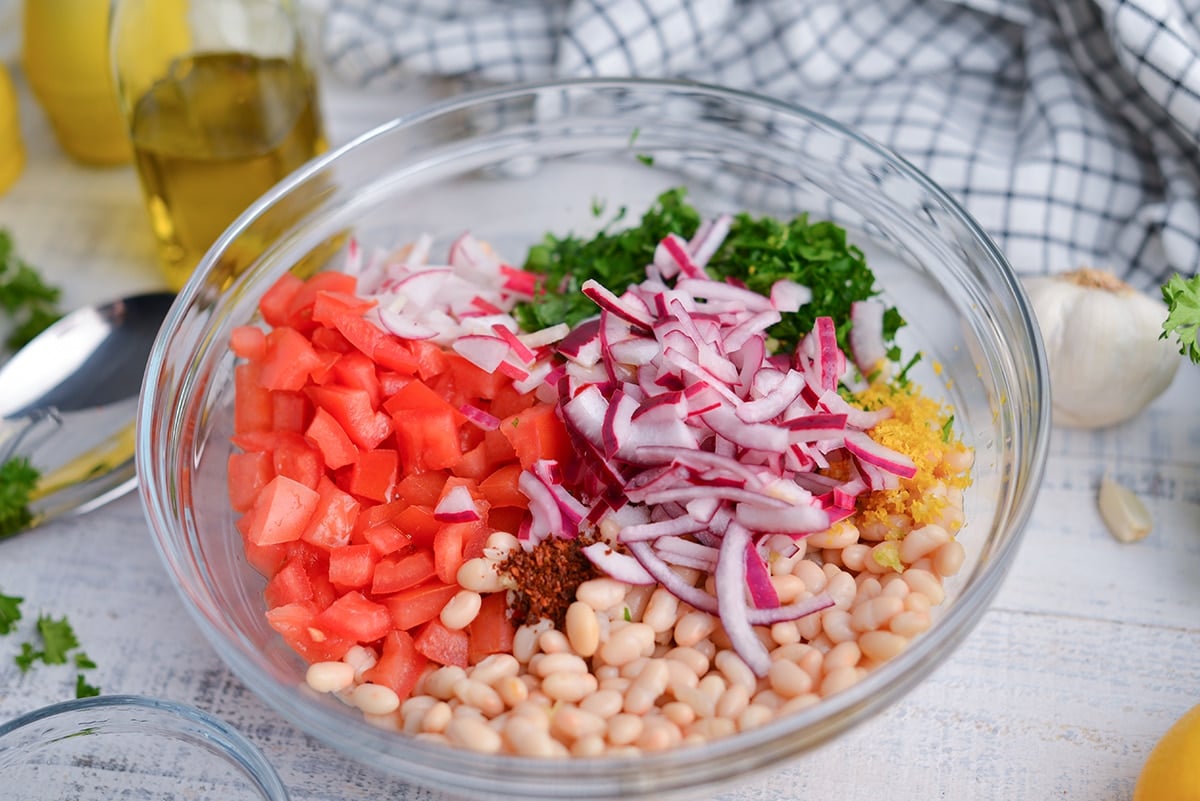 angle of bean salad with pickled red onions