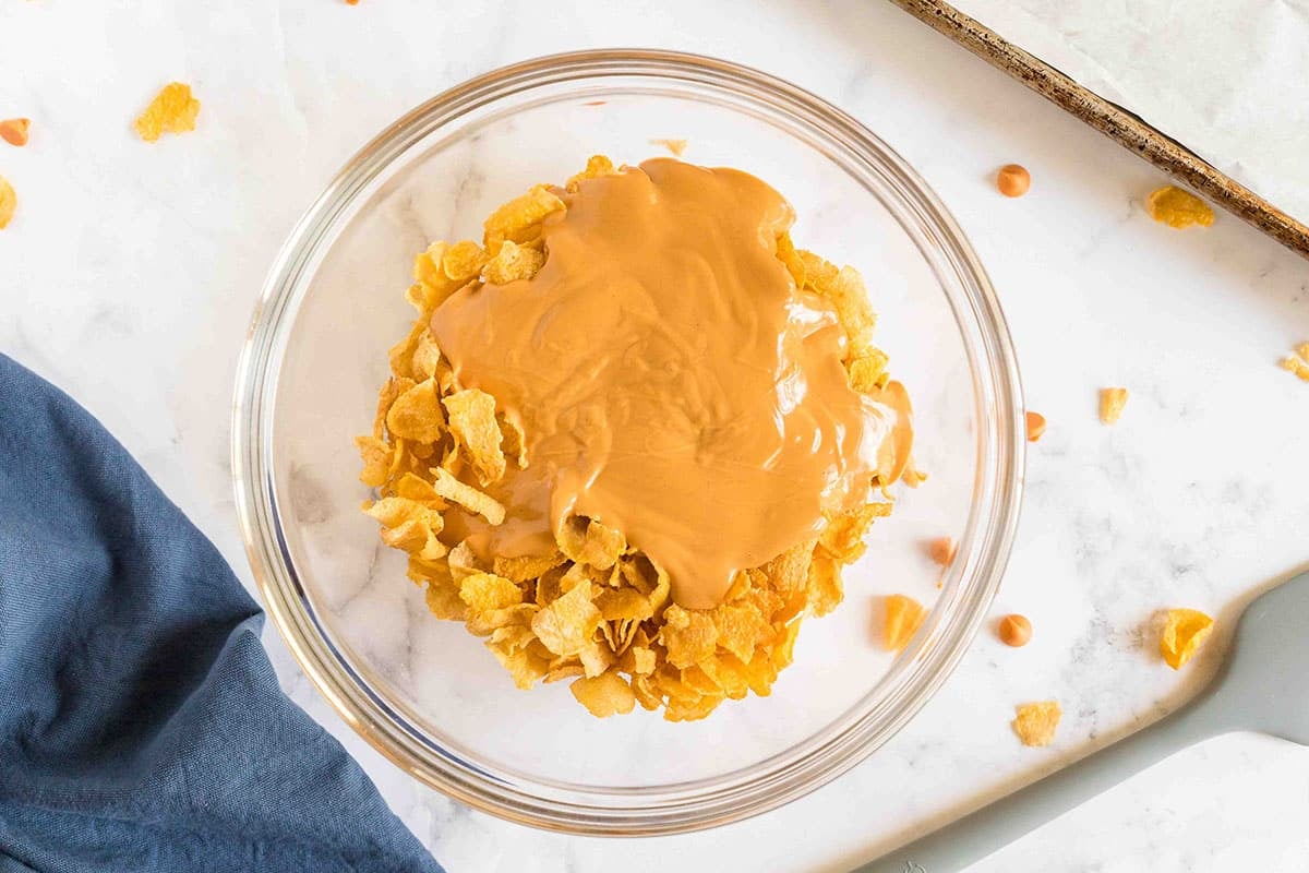 melted peanut butter poured over corn flakes