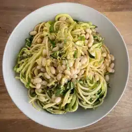 overhead shot of bowl of pasta with navy beans