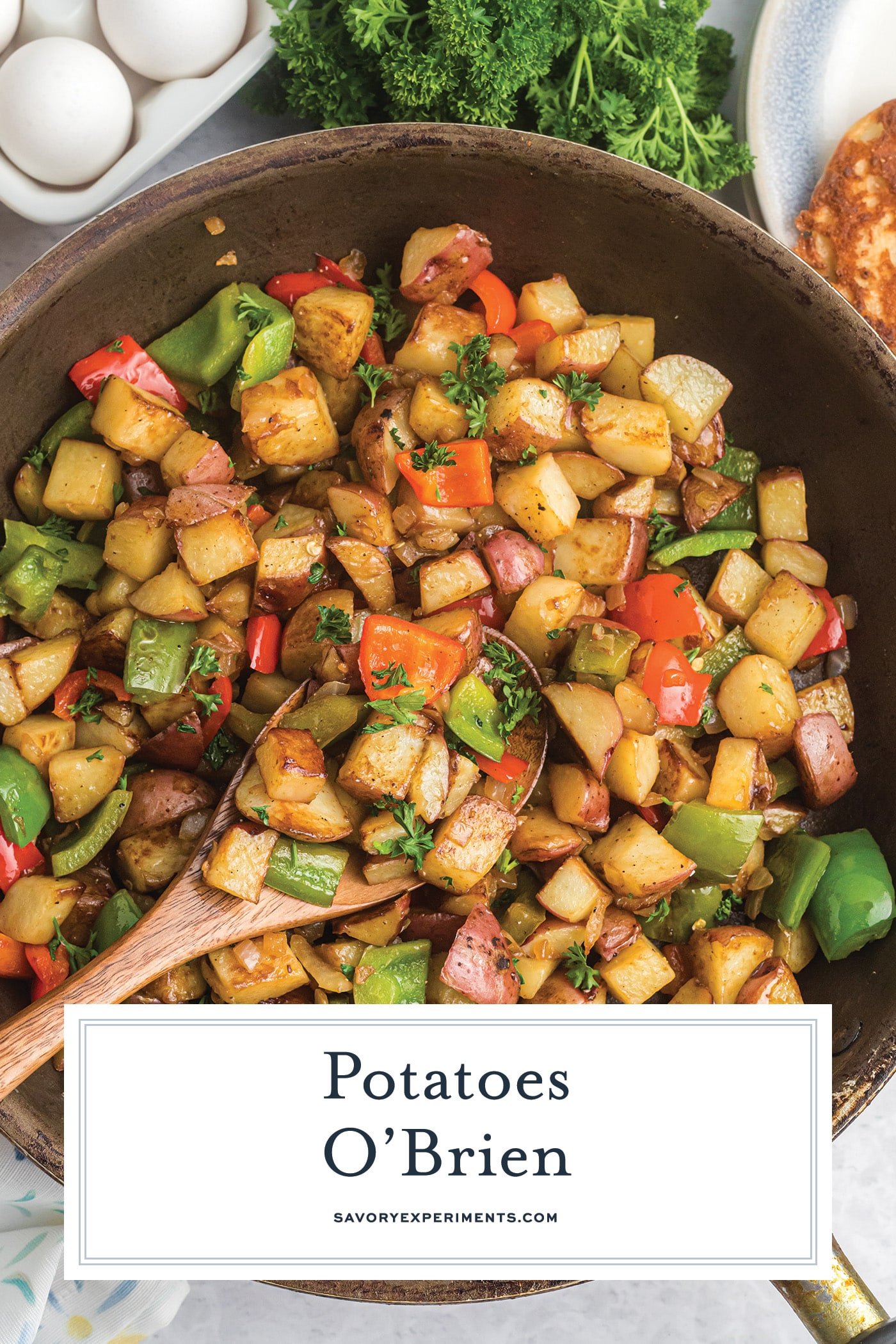 potatoes o'brien in a pan with text overlay for pinterest