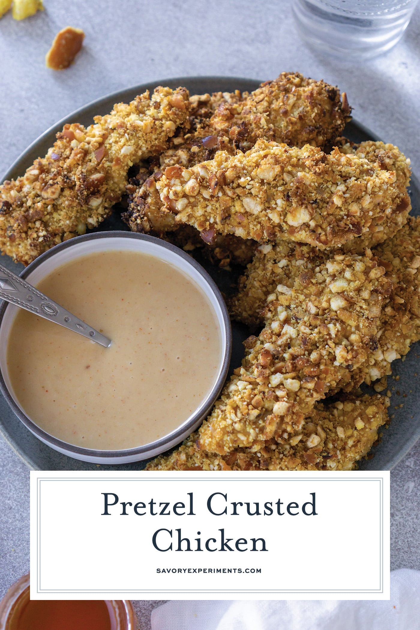 overhead shot of plate of chicken tenders with sauce with text overlay for pinterest