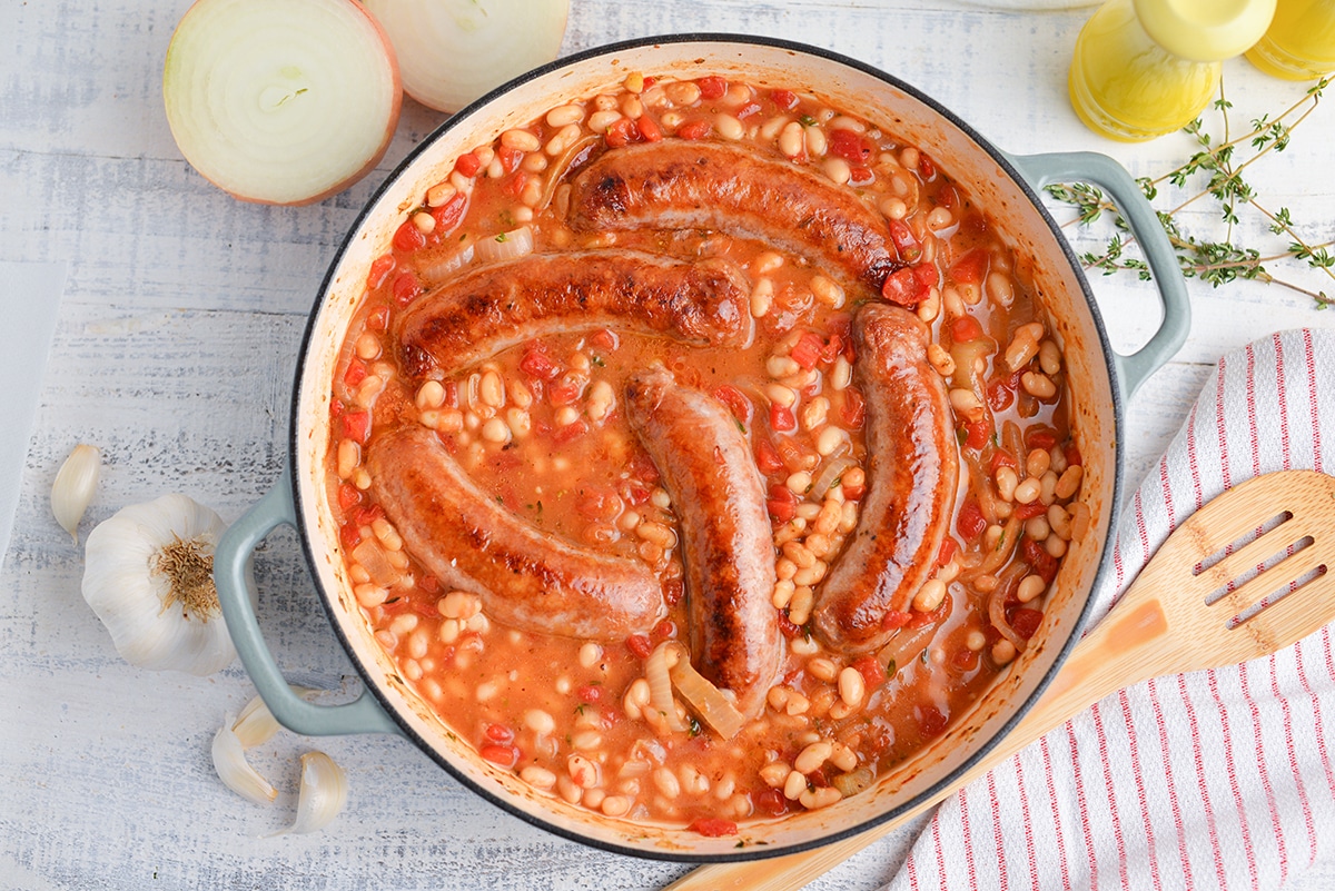 sausages and beans simmering in sauce