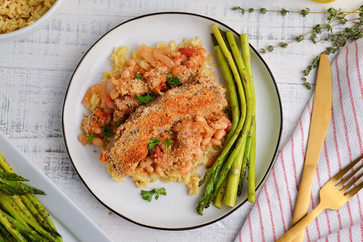 close up of white bean and sausage casserole being served