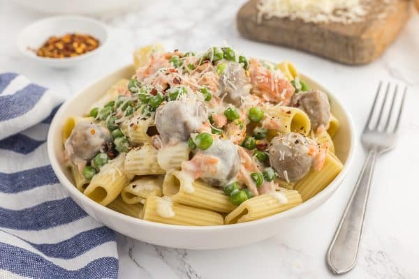 close up shot of smoked salmon pasta in bowl