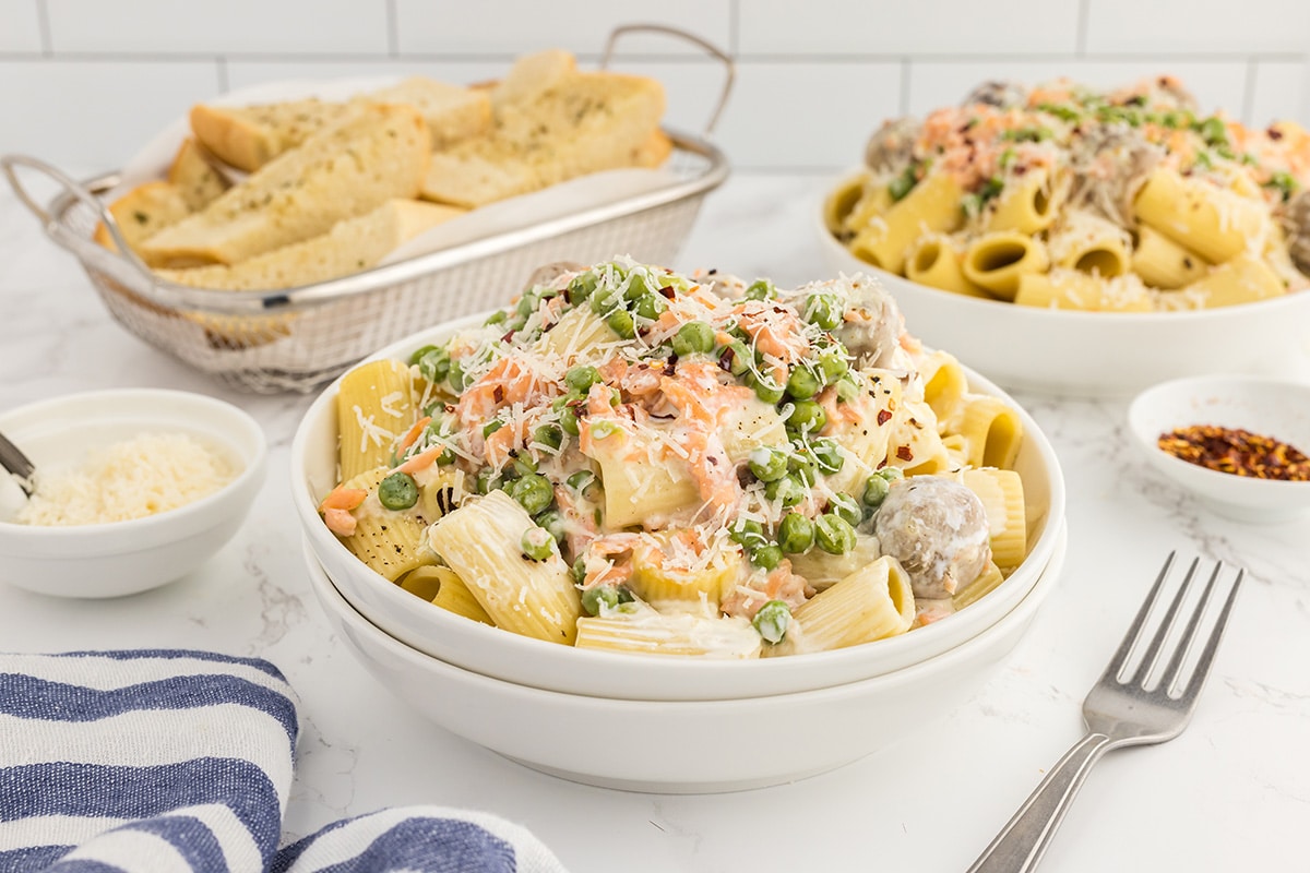 straight on shot of creamy salmon pasta in a bowl