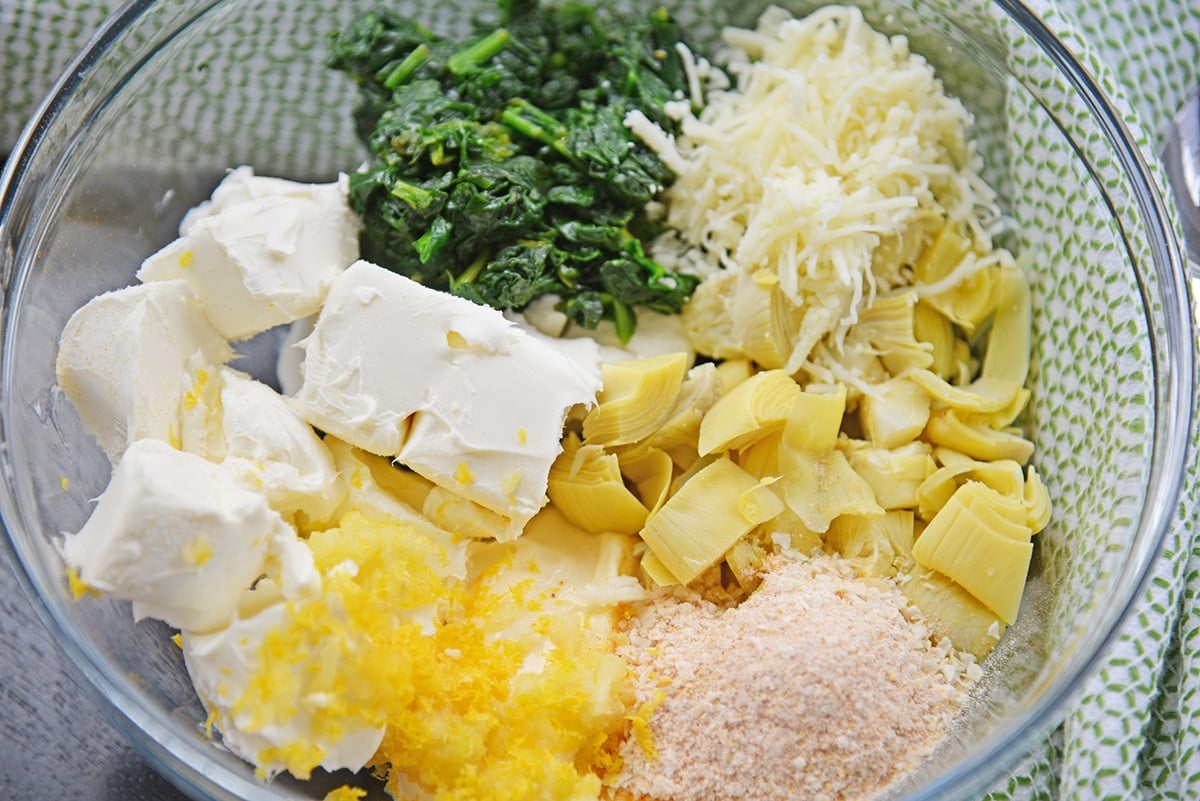 angle view of spinach and artichoke dip ingredients