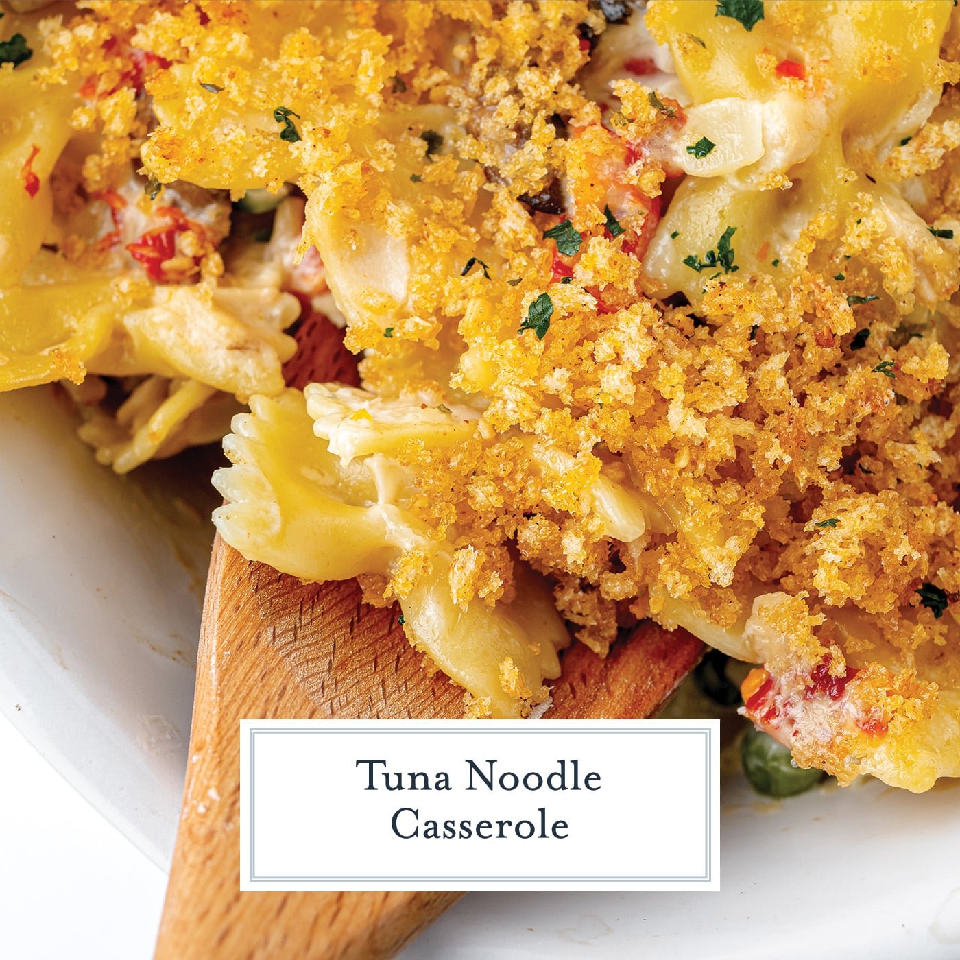 wooden spoon scooping tuna noodle casserole with text overlay for facebook