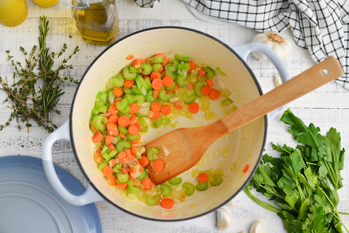 sauteing carrots, celery and onion in a dutch oven